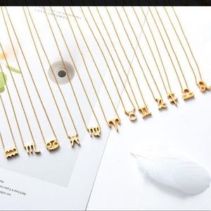 NWT Astrology Gold Necklace and earrings
